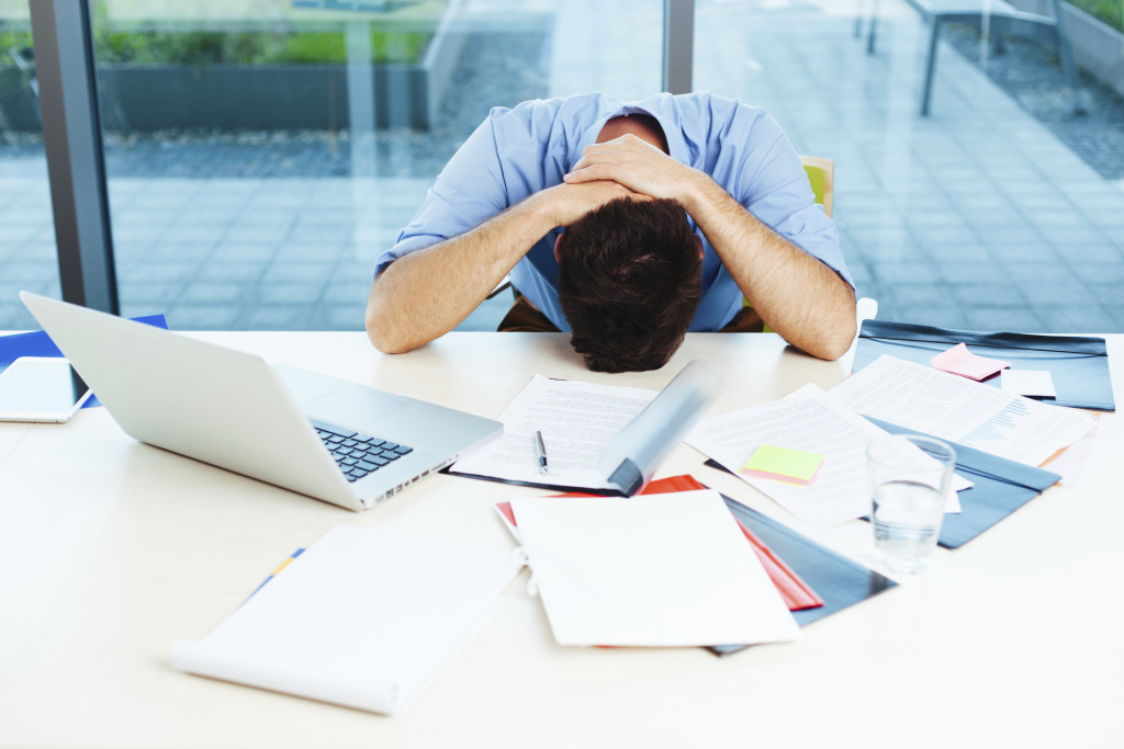 Businessman having stress in the office